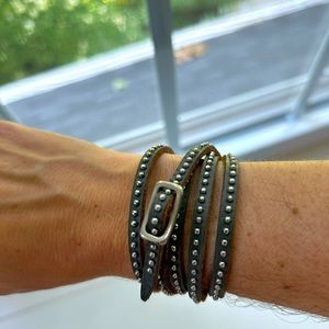 Gray leather bracelet with silver studs.  Super cute!